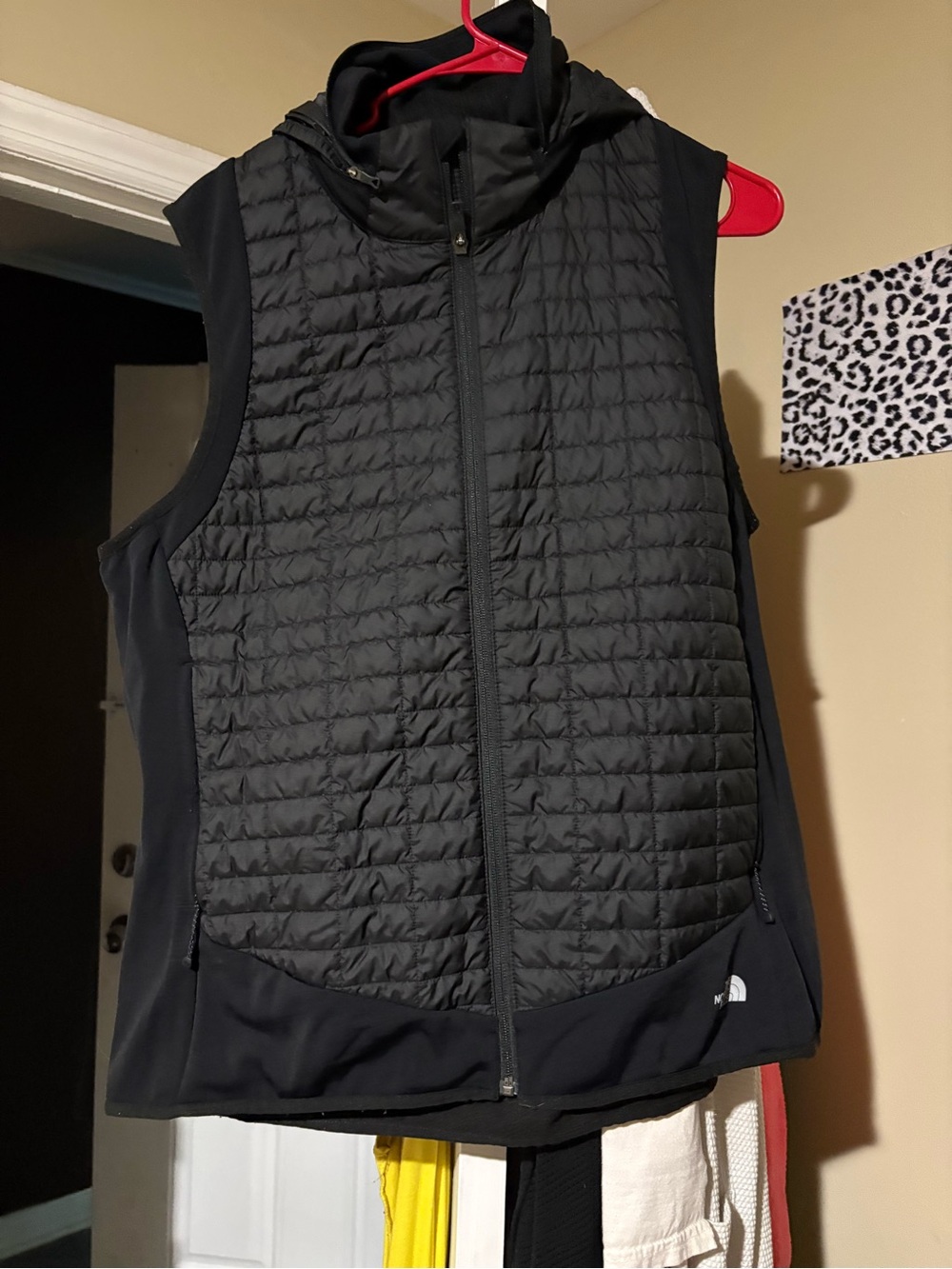 The North Face Women's Black Quilted Hooded Vest with Stretch Sides